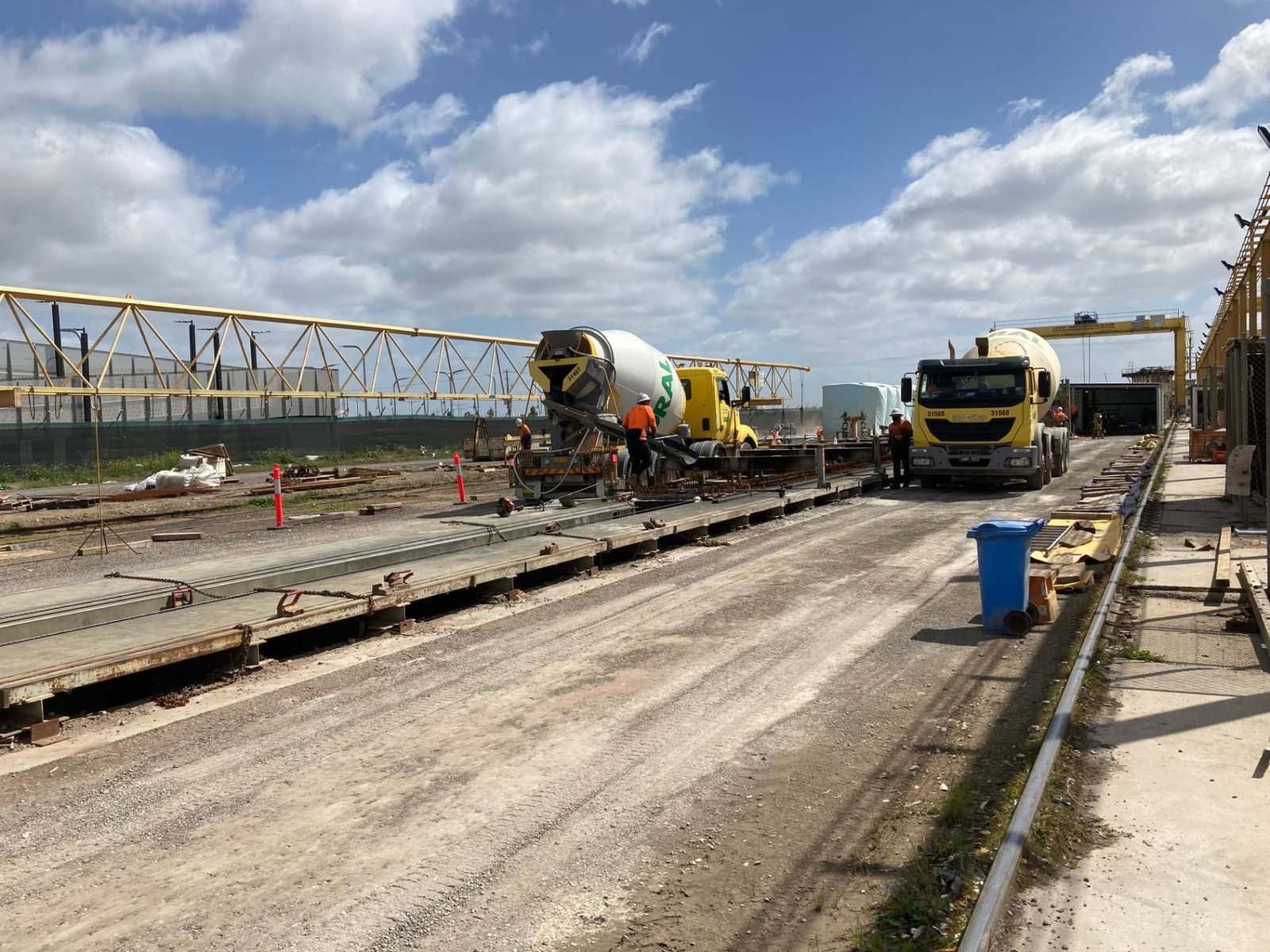 Walls, headworks and civil structures that carry the load.